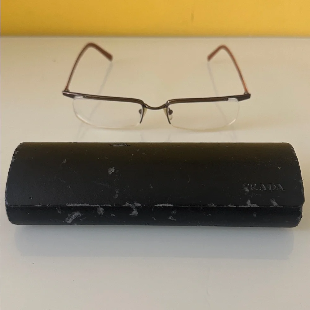Prada Sleek Bronze Titanium Frameless Rectangular Prescription Glasses Frame